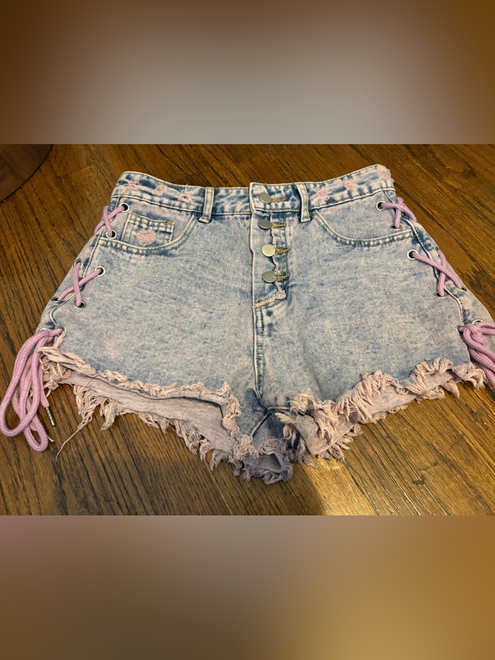 Light Acid-Wash Denim Shorts with Purple Lace-Up Trim